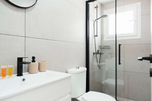 A stylish vanity with complimentary toiletries ready on arrival. - Modern Central Studio Walk to Beach & Dining (Lemesos)