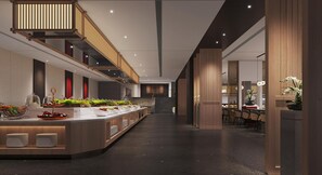 Un moderno vestíbulo de hotel con un mostrador de recepción central, una escalera y zonas de estar.