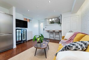 Living area - Quiet 1BR Basement Suite w/ Private Entrance (Toronto)