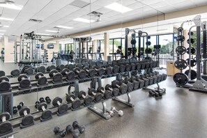 A gym with weightlifting equipment, treadmills, and exercise machines. - Gulf-View 2BR Condo | TOPS’L Resort & Beach Access (Miramar Beach)