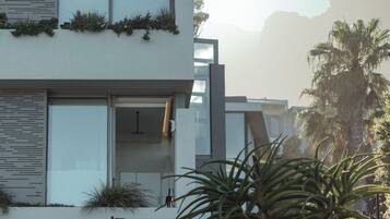 A modern building with large windows and a flat roof.