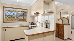 Kitchen  - Illa Villa is a charming townhouse just 50 meteres from Reddall Reserve. (Lake Illawarra)