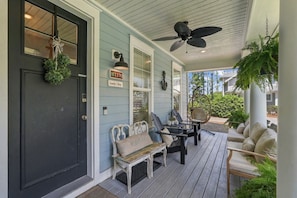 Welcoming front porch with seating and hanging chair - Sandestin Cottage on Raven Golf Course: 3 En-Suite BR, Golf Cart, Pool (Miramar Beach)