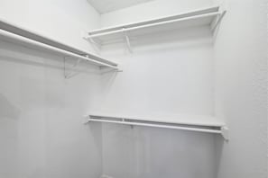A white interior space with three white shelving units mounted on the wall. - Family Friendly, Near The Lake, Games, BBQ, More (The Colony)