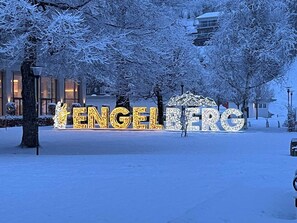 A snow-covered area with illuminated letters spelling 'ENGELBERG' and a statue in the background. - Am Bächli Appartement/Fewo 4-Bettwohnung by Interhome (Engelberg)
