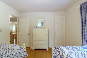 A bedroom with a white dresser, two beds with patterned bedding, and a mirror above the dresser. - 3 Mi to Dtwn Blue Ridge! Family Home w/ Fire Pit (Blue Ridge)