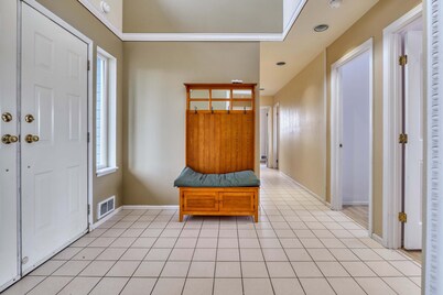 Serene 3BR Waterfront Home Balcony With Bay Views