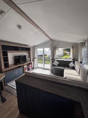 Living area - Rio's Retreat Unity Beach Brean, 2027 3 Bedroom Caravan with Full-Wrap Decking (Brean)
