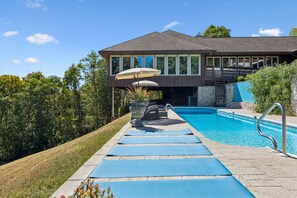 Pool Area: Spend your downtime poolside in this relaxing outdoor space, a great spot for swimming, soaking up the sunshine, and enjoying easy vacation moments. - Breathtaking mountain-view home w/ exclusive pool! (Goodlettsville)