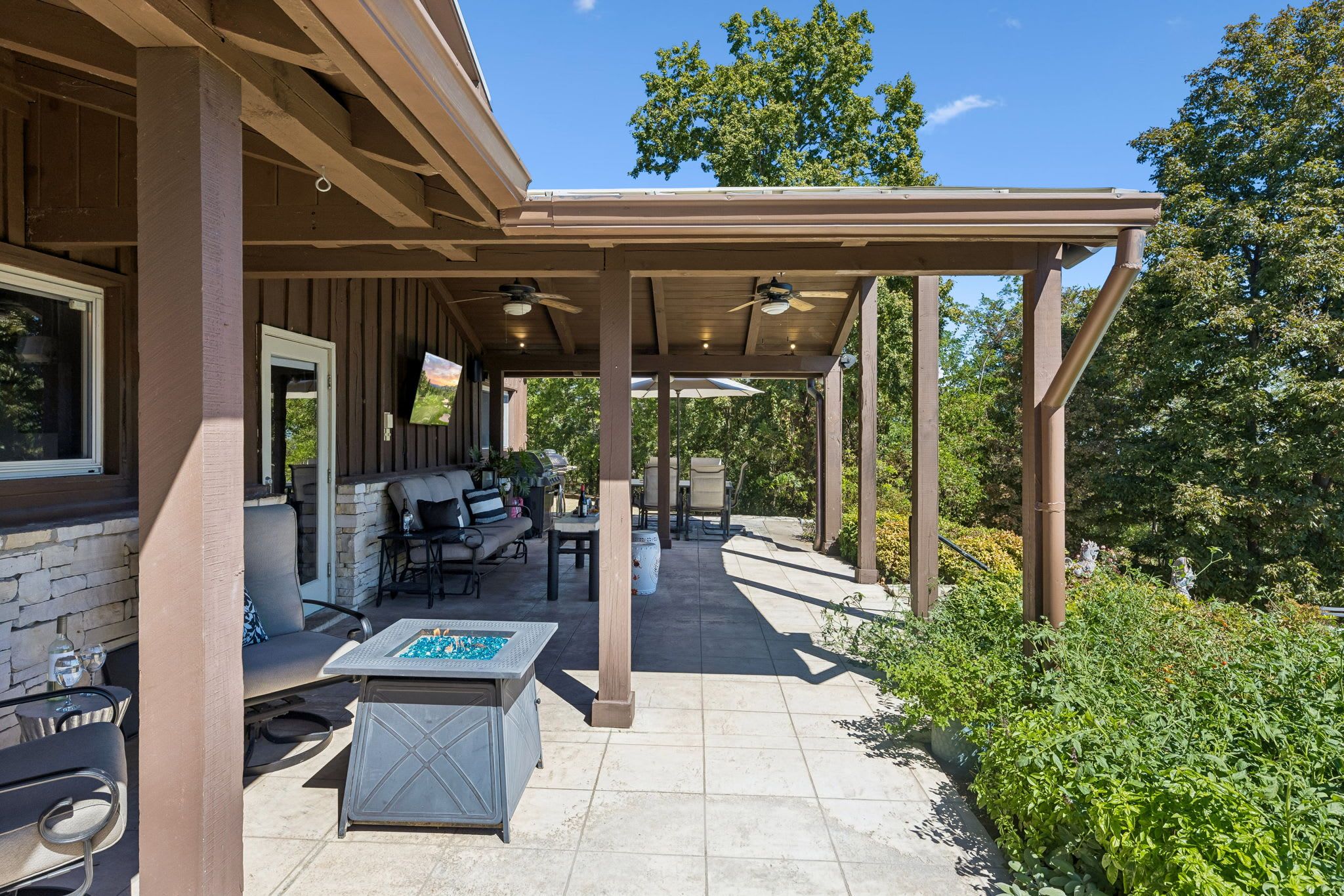 Patio: Relax on this inviting patio with comfortable seating, perfect for morning coffee, casual conversations, or unwinding outdoors after a full day of activities.