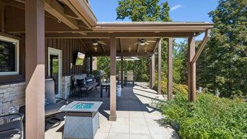 Patio: Relax on this inviting patio with comfortable seating, perfect for morning coffee, casual conversations, or unwinding outdoors after a full day of activities.