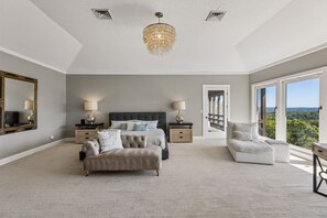 Bedroom 1: This roomy bedroom offers plenty of space to settle in, relax, and enjoy a peaceful night’s sleep throughout your stay. - Breathtaking mountain-view home w/ exclusive pool! (Goodlettsville)