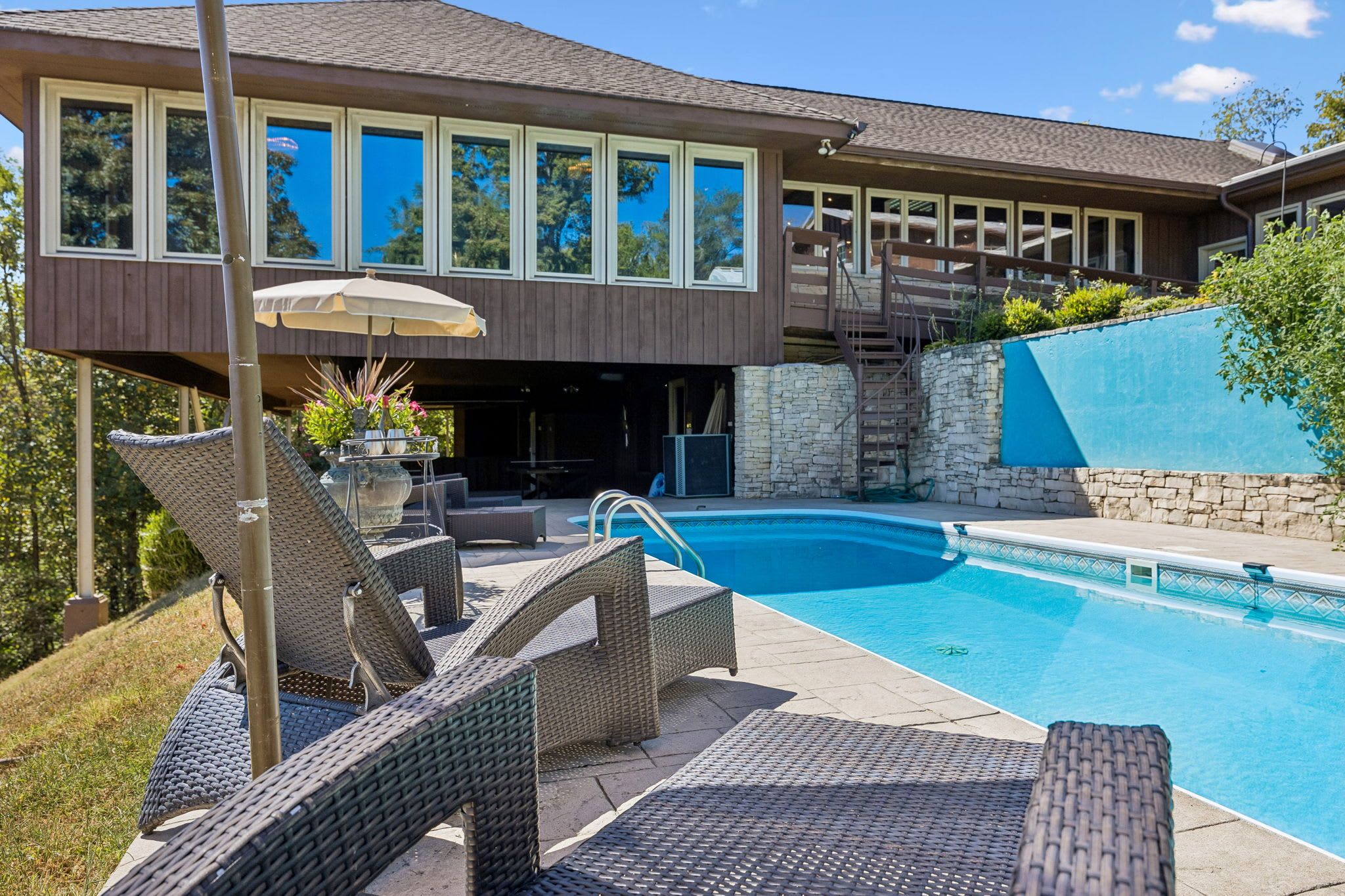 Pool Area: Spend your downtime poolside in this relaxing outdoor space, a great spot for swimming, soaking up the sunshine, and enjoying easy vacation moments.