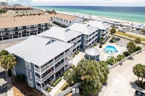 A hotel with multiple buildings, a swimming pool, and a beach view. - ⭐Across St from Beach Access-Gulf Views-Pool+Hot Tub-Summer Breeze 310⭐ (Miramar Beach)