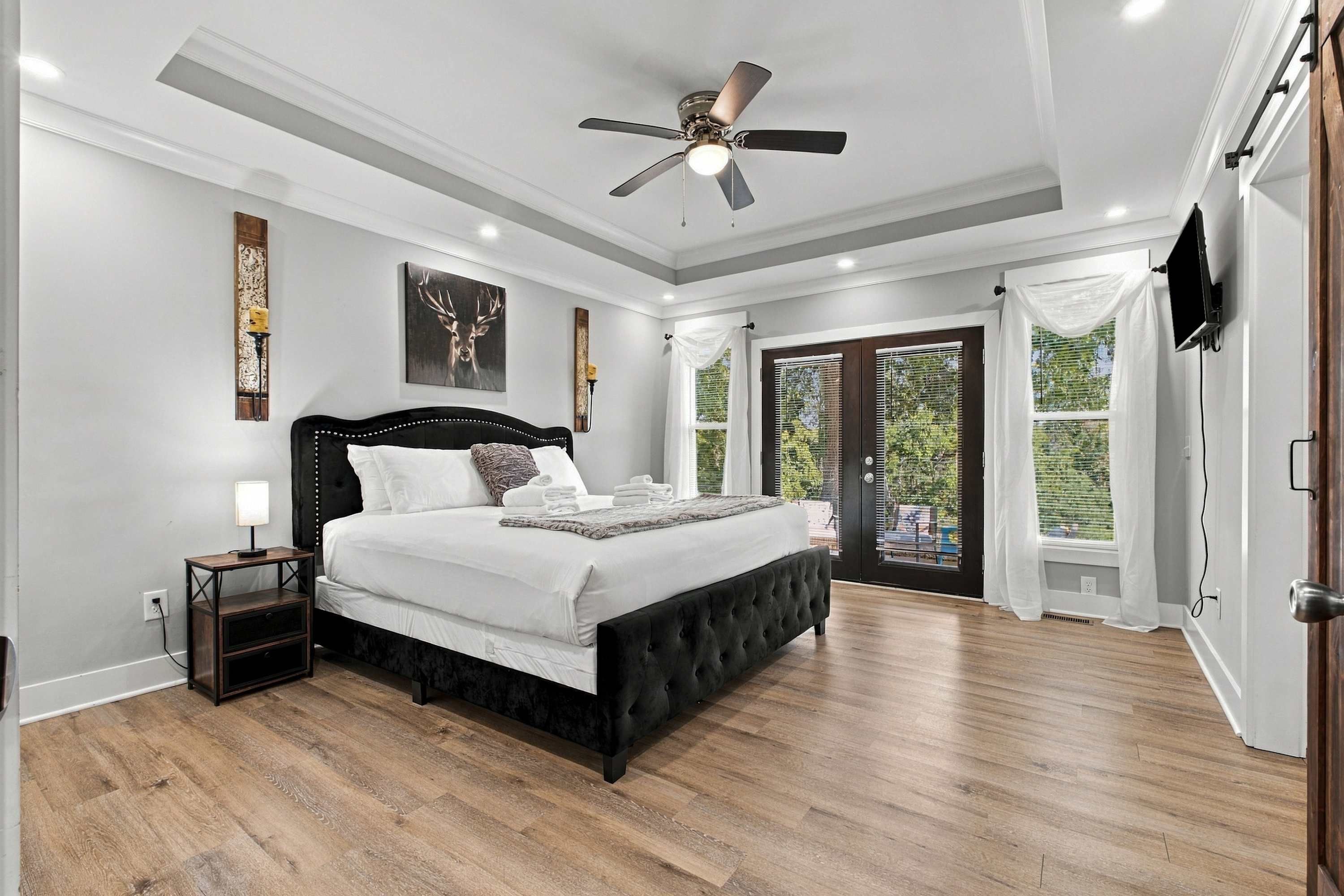 The primary suite features a comfortable king bed.