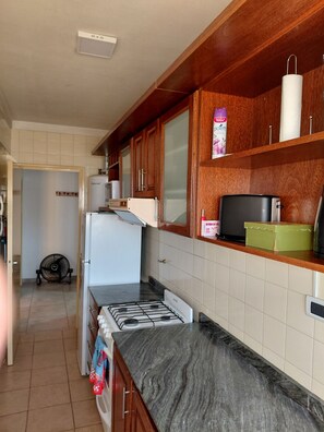 Private kitchen - High-floor apartment, 200 meters from the ocean. Perfect for couples. (Mar del Plata)