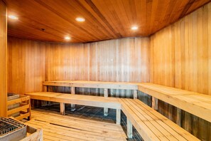 A sauna with wooden benches and a tiled floor. - Turquoise Place C2104 | Special Stocked Extras! | Sleeps 12 (Orange Beach)