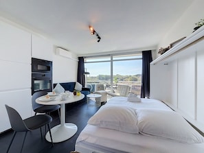 Interior Design, Furniture, Flooring, Ceiling, Floor, Room, Apartment, Bedroom, Bed, Television