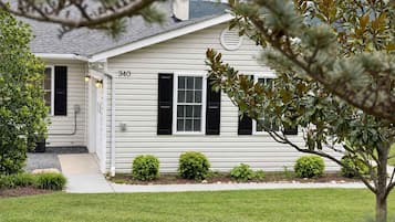 A two-story house with a number 340 on the front.