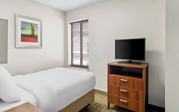 Kick back with your favorite shows and soft natural light. - Fun-Filled Cranberry Stay | 2 Bedrooms & Free Full Breakfast (Cranberry Township)