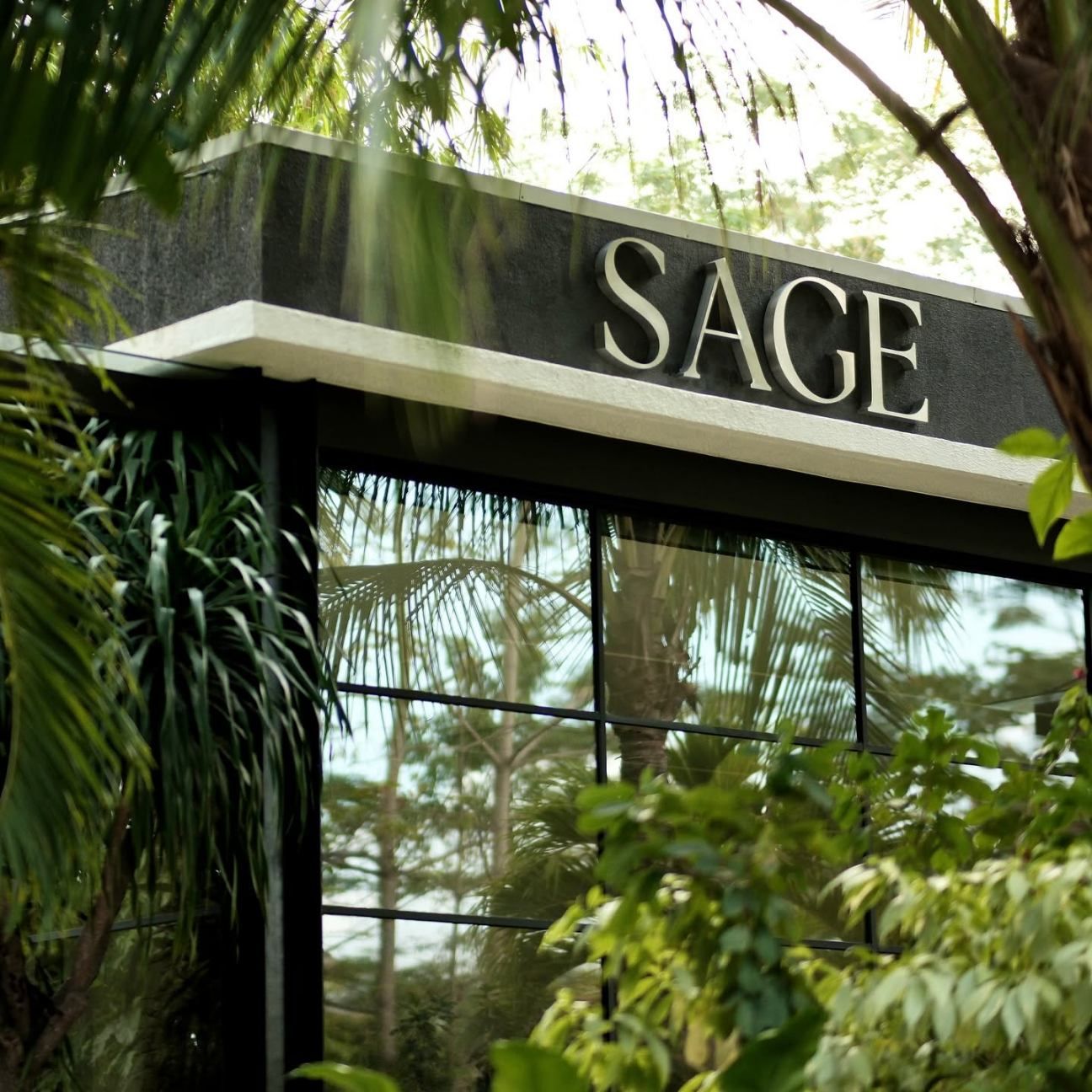 A building with a sign that reads 'SAGE' above a window.