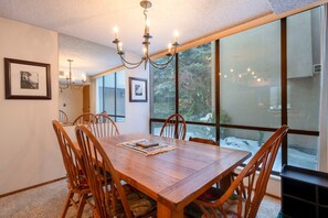 Good food, great views, and wonderful company — the dining room at Park Avenue 231 makes every meal feel like a special occasion. - Park Ave 231 | Heated Pool | Hot Tub | Near PCMR | Trail-Side by Golf Course | Walk to Shops (Park City)