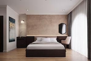 A modern hotel bedroom with a large bed, a bedside table, a chair, a wall-mounted mirror, and a painting on the wall. - Ninh Bình Macaron Hotel (Hoa Lu)