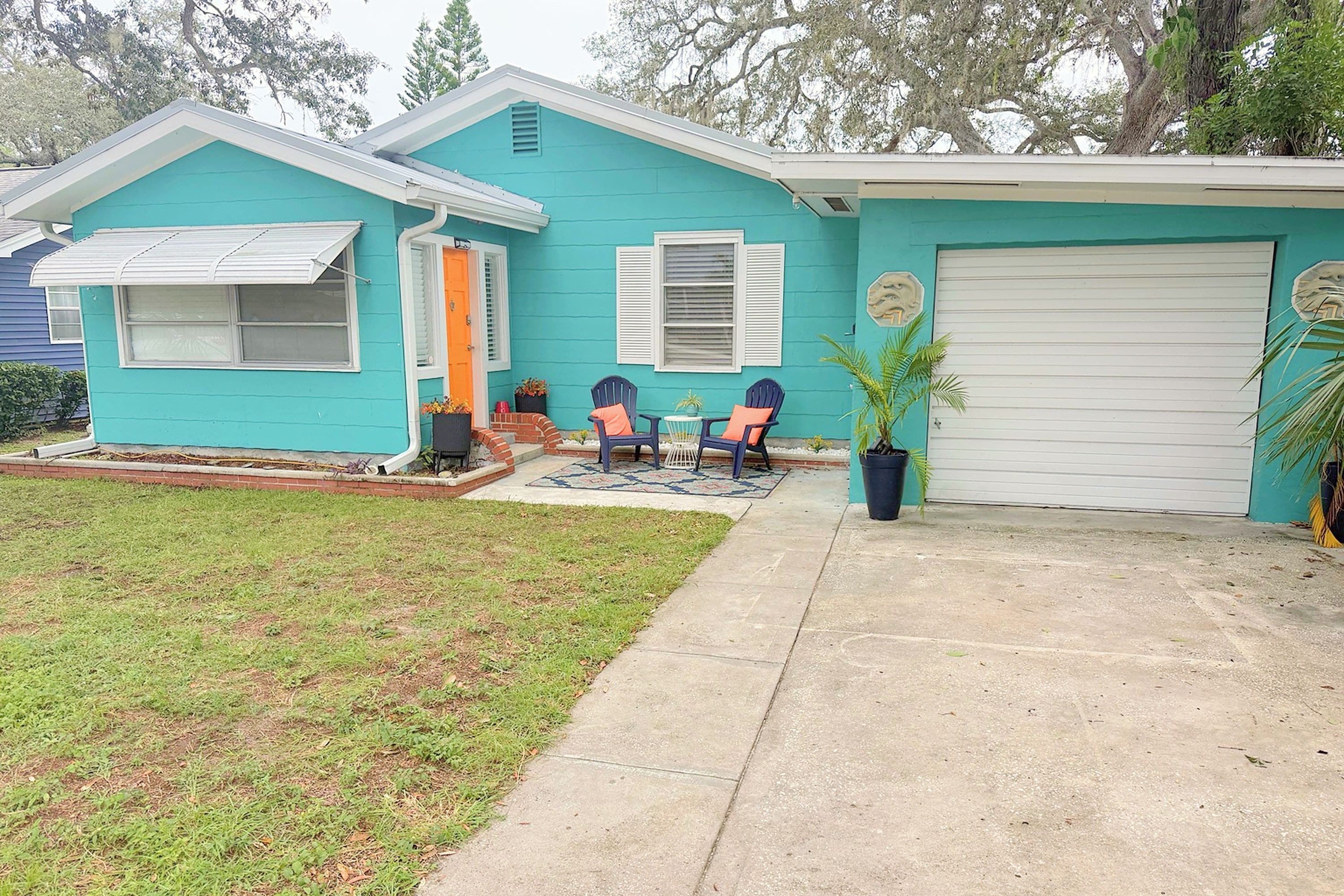 Welcome to Tipsy Tangerine Cottage — a cheerful turquoise Florida cottage in the Bay Pines area, about 1 mile to Madeira Beach.