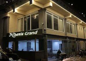 A building with a sign reading 'Nivanta Grand'.