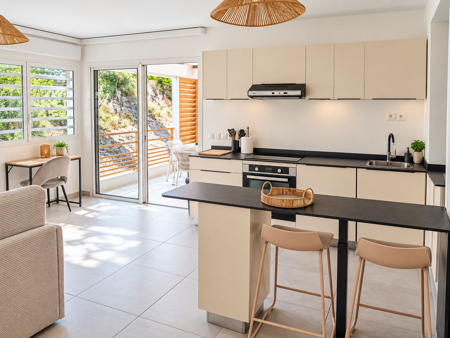 A modern kitchen with a central island, bar stools, and a dining area with a table and chairs.
