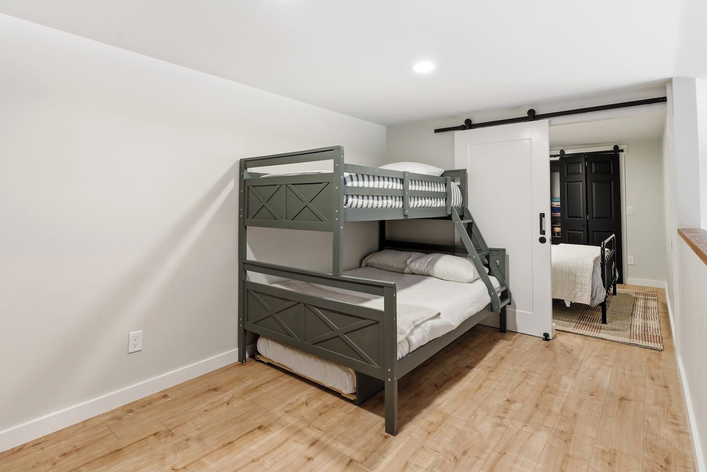 Bedroom 2 with double bed and bunk beds