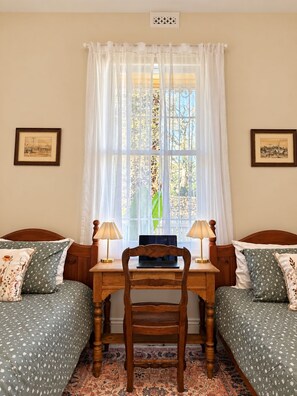 A bedroom with two beds, a wooden desk, and a laptop. - Entire 3BR Beachside House in the Heart of St Kilda (St Kilda)