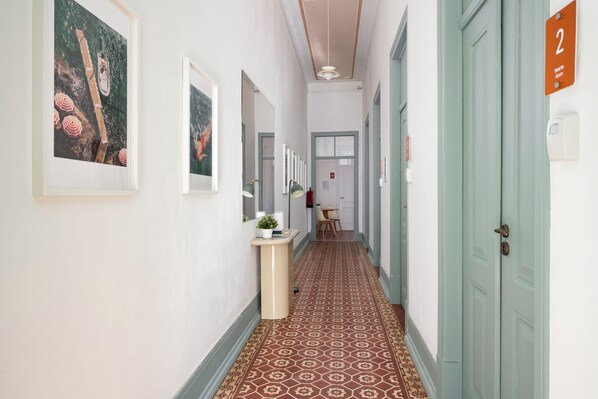 Bright, charming hallway with vintage tile floors and boutique-style details - Casa Dona Irene Sunny Terrace | Room 1 | Early or Late Check-in (Faro)