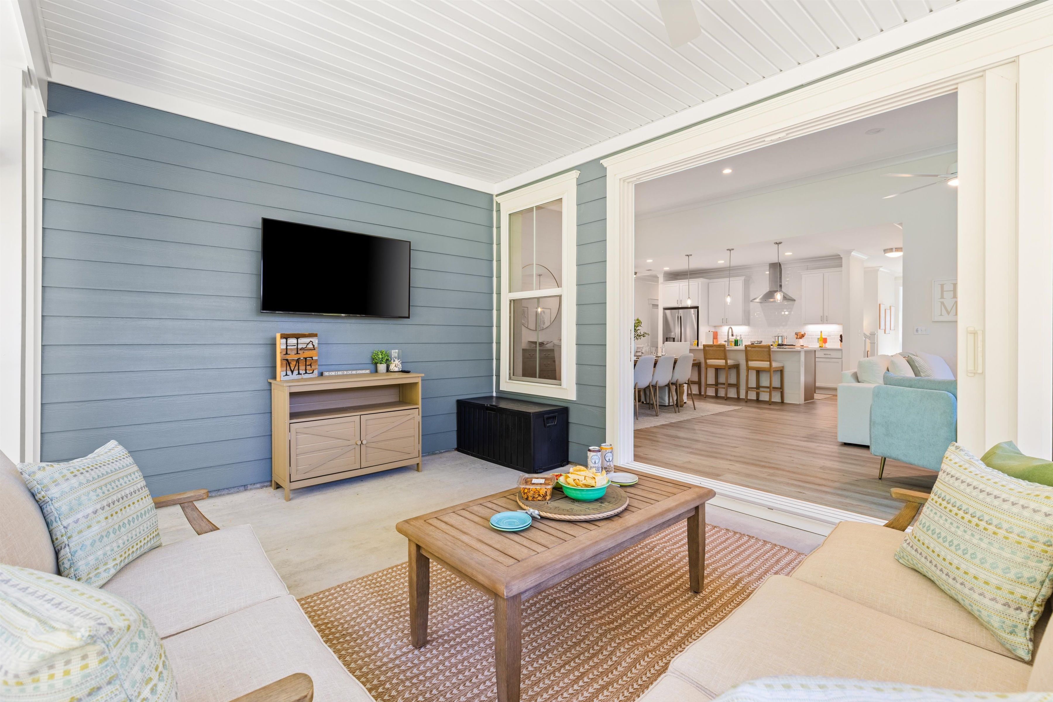 Covered patio with outdoor TV and seamless indoor-outdoor living