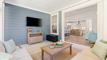 Covered patio with outdoor TV and seamless indoor-outdoor living
