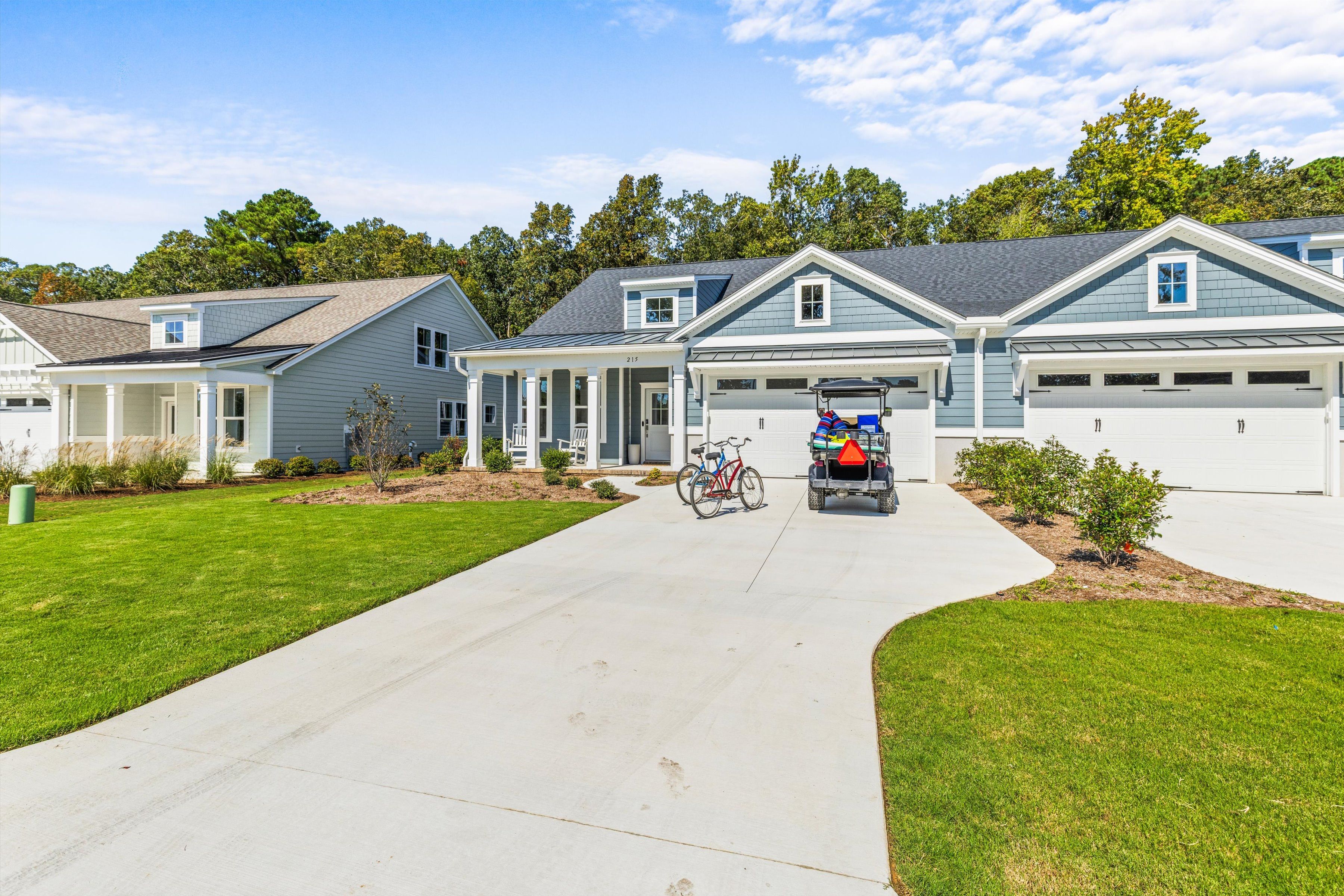 Charming coastal-style home with 3-car garage and inviting curb appeal