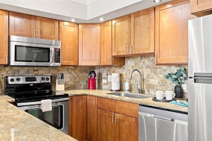 The kitchen is supplied with the essentials you need to prepare meals and enjoy your stay on Maui. - Polished 1 Bedroom South Kihei Condo Near Beach (Kihei)