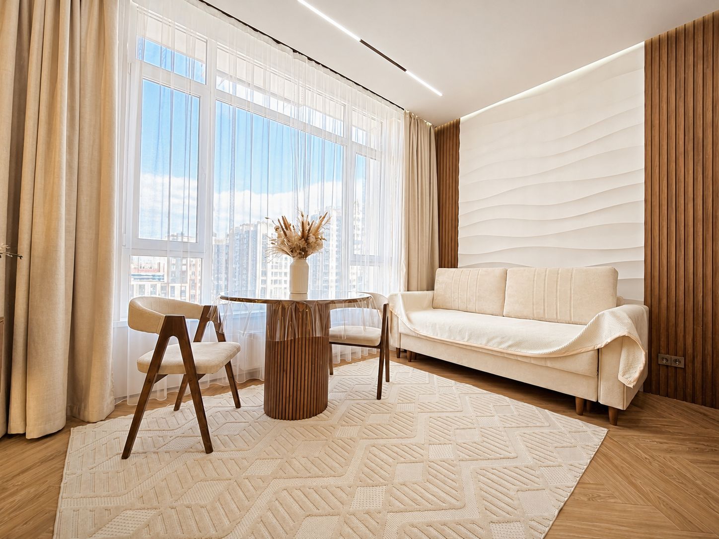 A modern living room with a sofa, two chairs, a coffee table, and a large window with curtains.