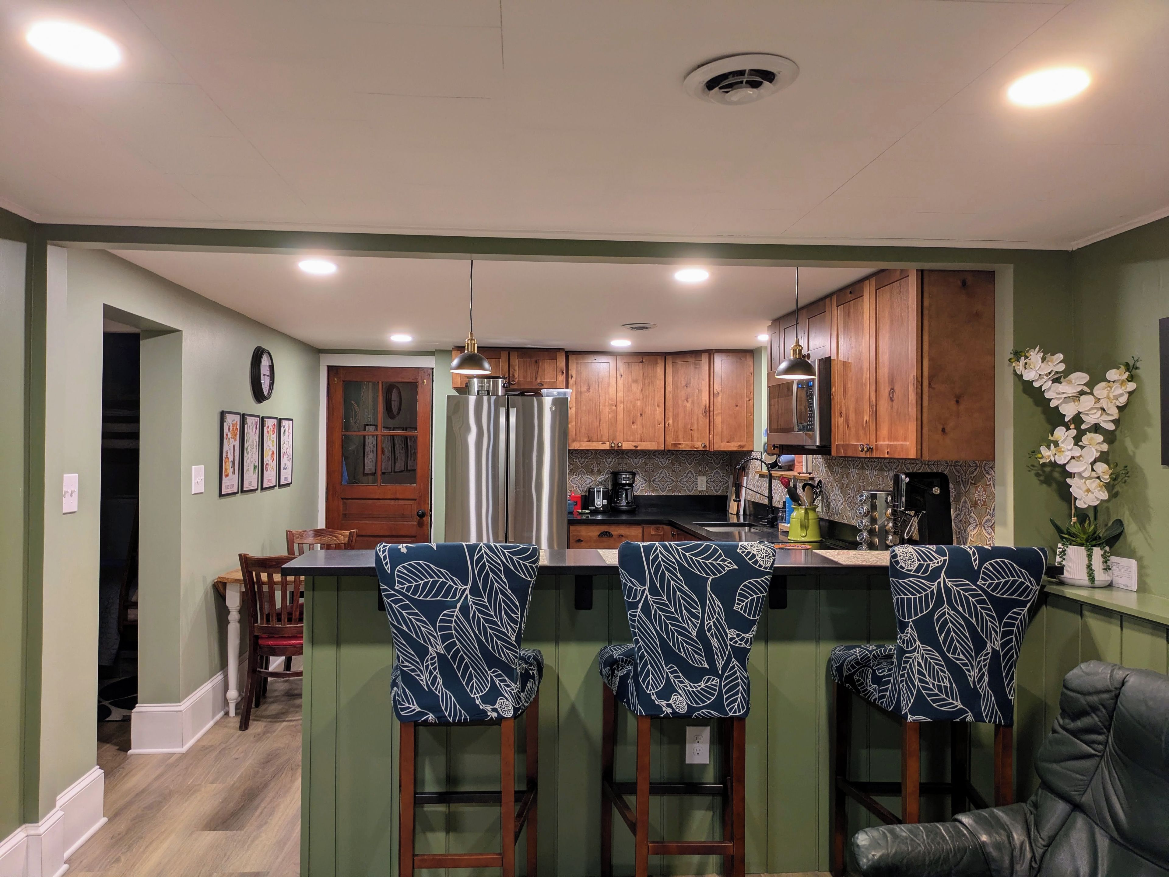 open concept LR/Kitchen separated by bar