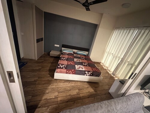 Bright 2-bedroom apartment-Rajhans Belliza offering comfort style Wi-Fi parking