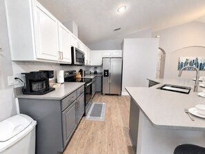 Kitchen - 4BR Lake View Home Near Disney - Private Heated Pool, Spa & Game Room (Kissimmee)