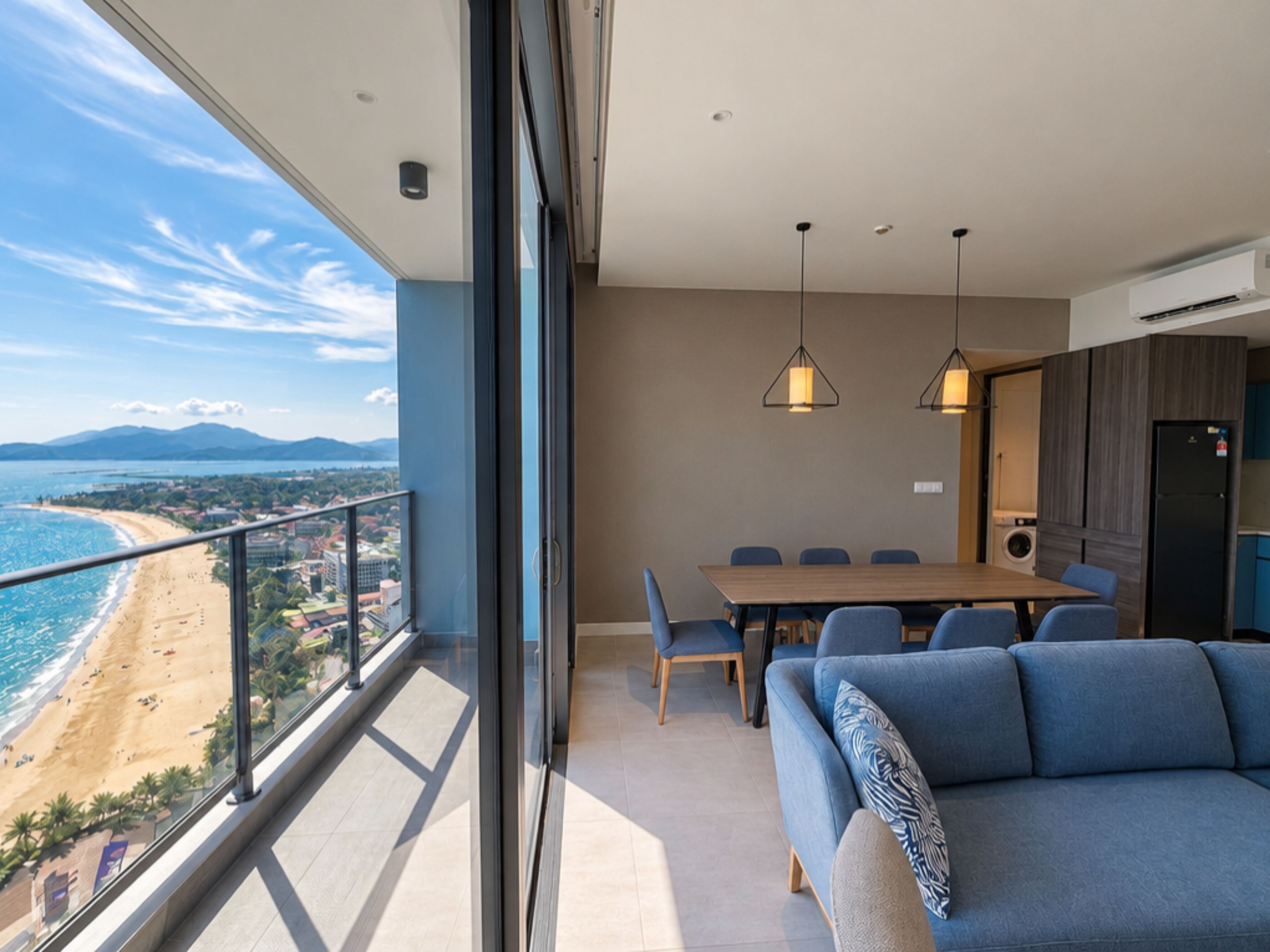 Modern beachfront condo with private balcony and panoramic ocean views