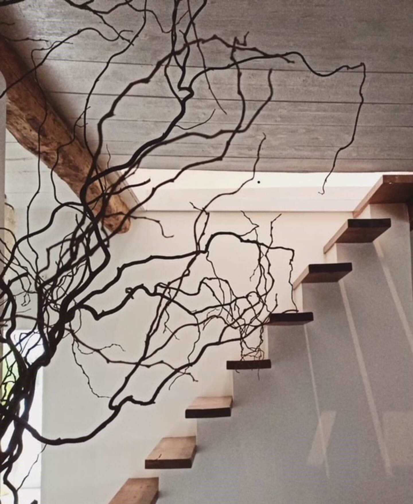 A staircase with wooden steps and a modern design.