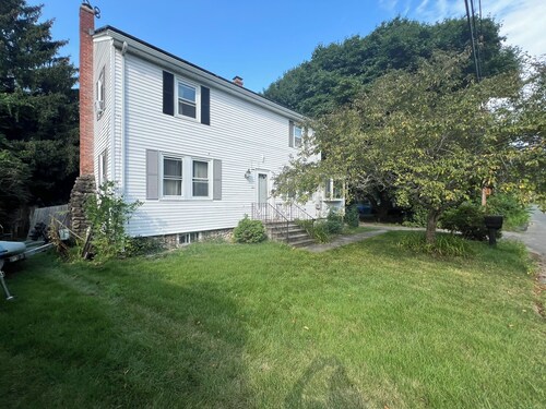 Riverfront property with pool, hot tub, gym, pool table and bar in basement.