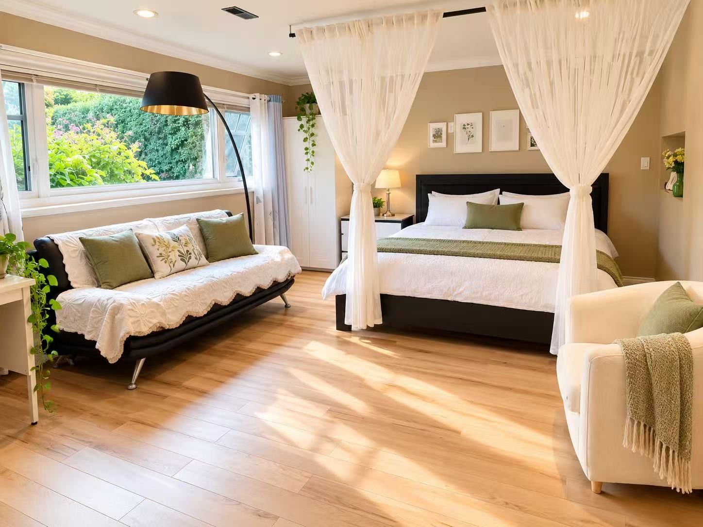 A bedroom with a bed, a sofa, a bedside table, a lamp, and a window with curtains.