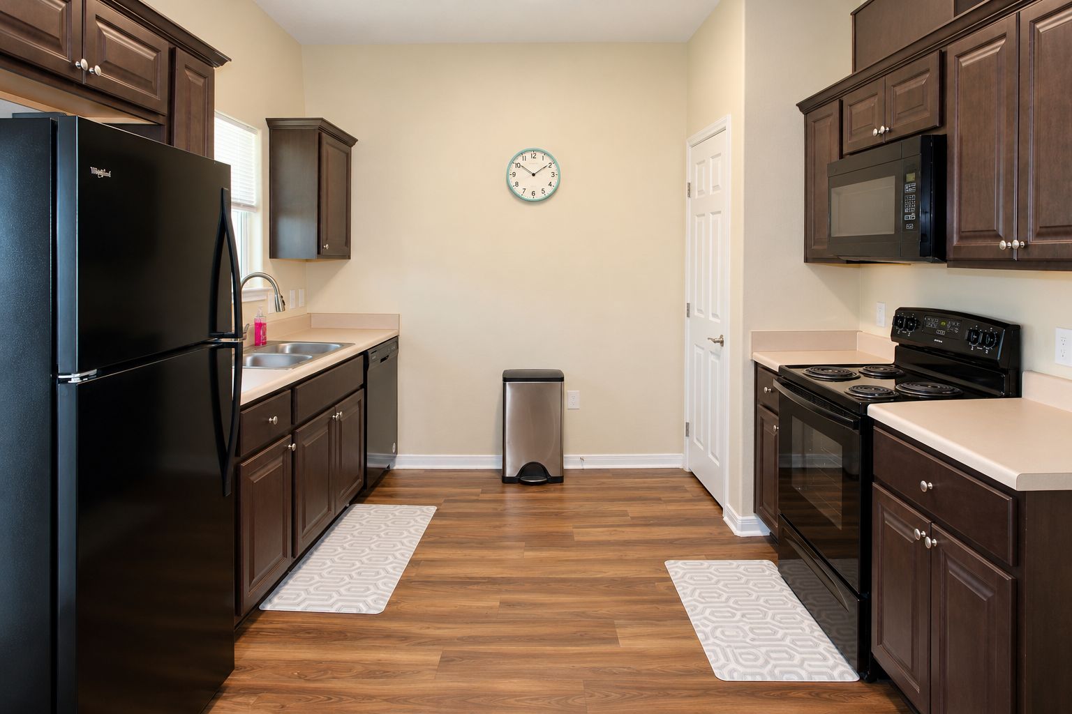 Wide galley kitchen with dual counters