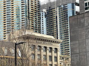 A building with a classical facade and the name 'Batman's Hill on Collins.' - Stylish High-Rise City Retreat near Southern Cross (Melbourne)