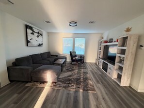 Living area - Modern Retreat 3BR+Bonus Room with Sauna & Fenced Yard (Vacherie)