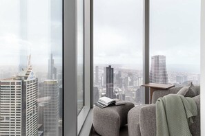 Floor-to-ceiling windows showcase Melbourne at its best. - Sky High 2BR with Spectacular City Views (Melbourne)