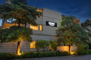 A modern building with a sign reading 'PALETTE.' - Palette Hotel And Resort Igatpuri (Igatpuri)